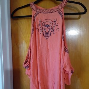 Shoulder cut out blouse.